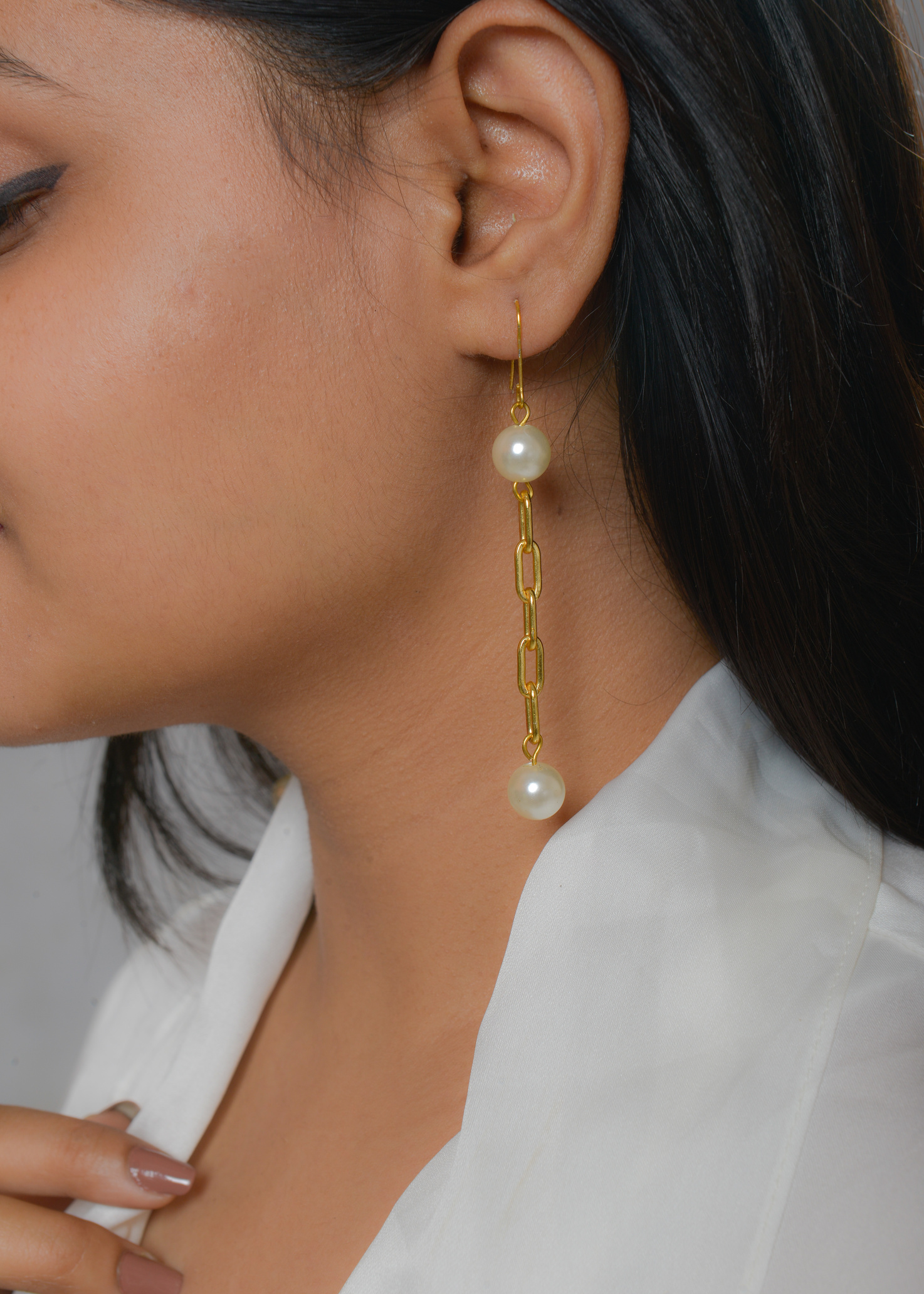 Woman Wearing Dangle Earrings