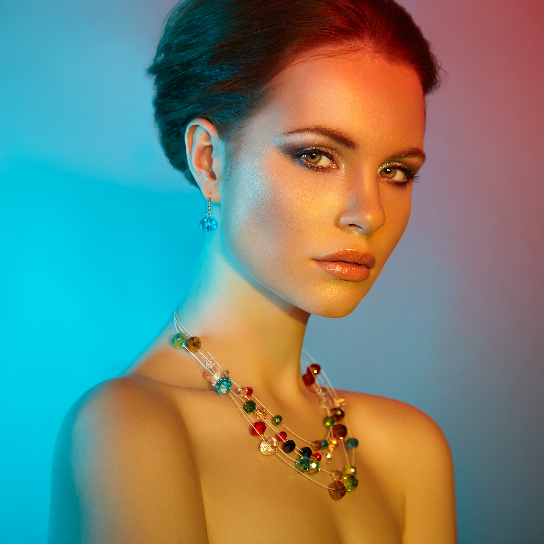 Fashion Portrait of Elegant Woman Wearing Jewelry 